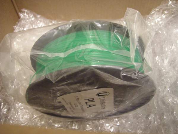 1.75mm reel of green PLA filament